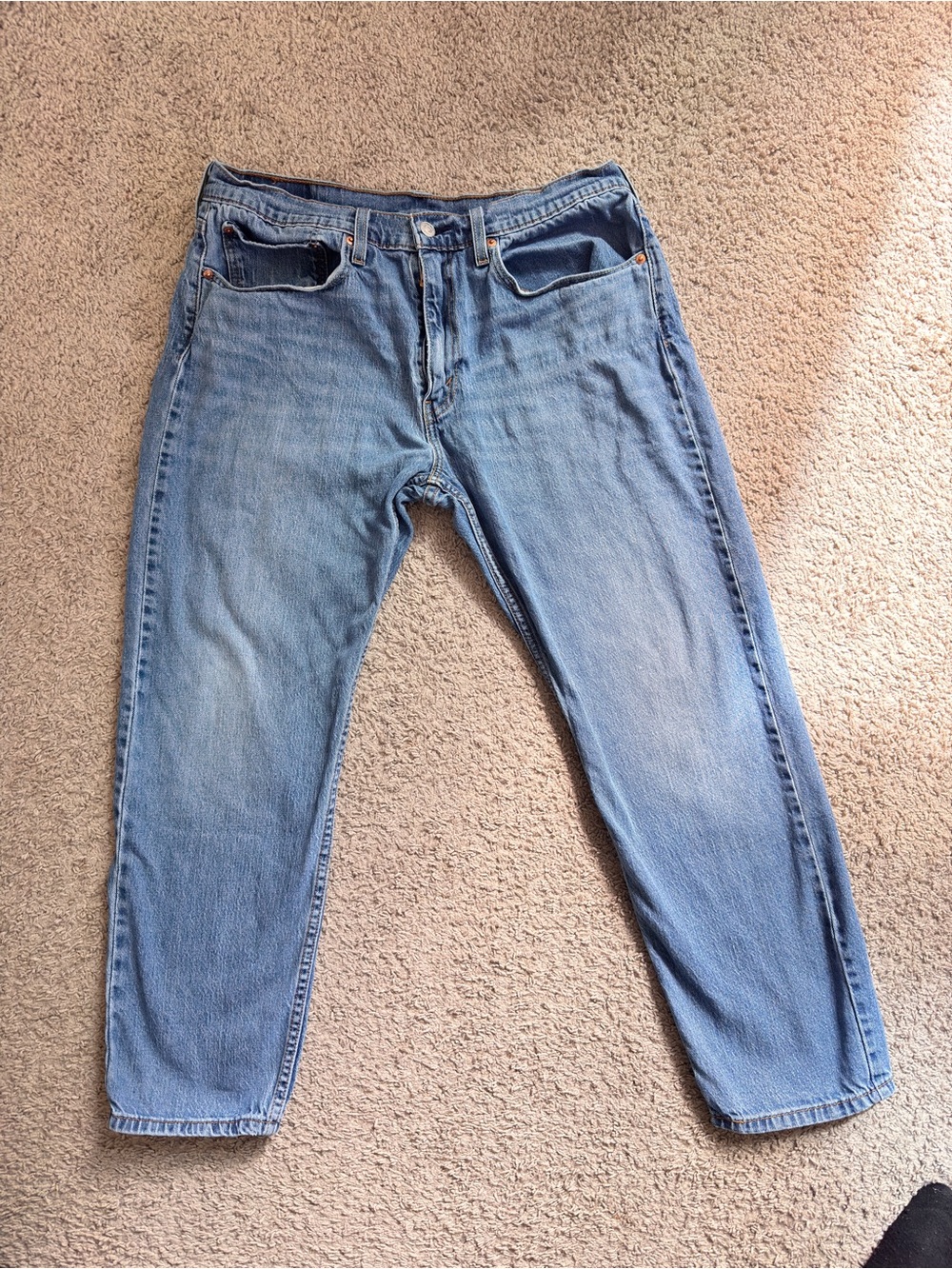 Levi’s 502 blue jeans